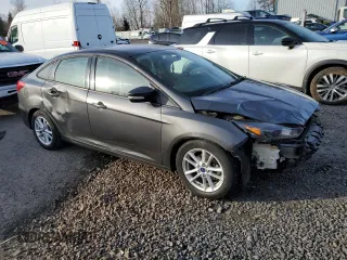 2015 Ford Focus SE with VIN 1FADP3F29FL203974, listed as a Copart auction lot 45053395 with 138,651 mi miles and Salvage Title. Bid and sale history available at carsss.com. Image 4.