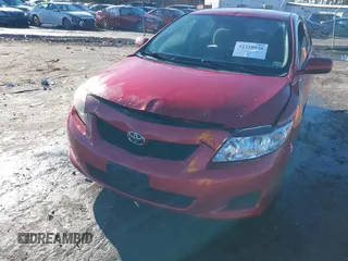 2009 Toyota Corolla with VIN JTDBL40E99J004929, listed as a IAAI auction lot 41210936 with 135,663 mi miles. Bid and sale history available at carsss.com. Image 6.
