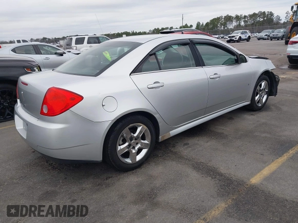 2009 Pontiac G6 1SB z VIN 1G2ZJ57B994252266, wystawiony jako IAAI lot #41609938 z przebiegiem 162 412 mil mil oraz . Historia ofert i sprzedaży dostępna na DreamBid. Obrazek 4.