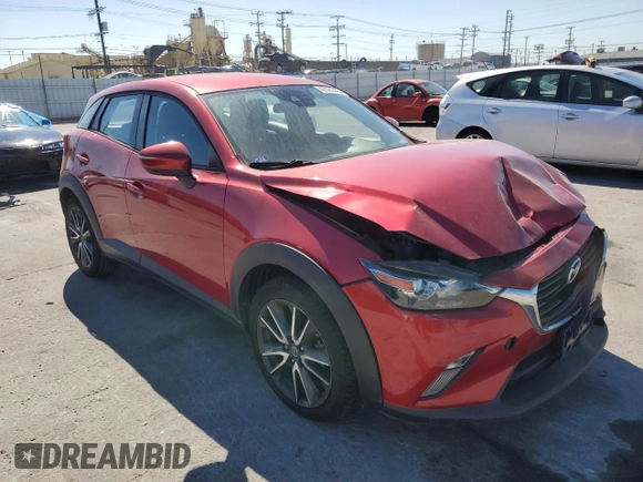 2018 Mazda CX-3 Touring with VIN JM1DKDC78J1307830, listed as a Copart auction lot 47021665 with 39,088 mi miles and Salvage Title. Bid and sale history available at carsss.com. Image 4.