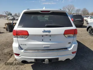 2014 Jeep Grand Cherokee Overland with VIN 1C4RJFCT7EC105296, listed as a Copart auction lot 50822775 with 180,067 mi miles and Salvage Title. Bid and sale history available at DreamBid. Image 6.