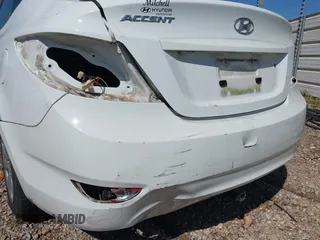 2012 Hyundai Accent GLS with VIN KMHCT4AE9CU254224, listed as a IAAI auction lot 41964055 with 86,501 mi miles. Bid and sale history available at carsss.com. Image 6.