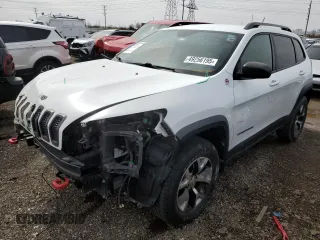 2015 Jeep Cherokee Trailhawk with VIN 1C4PJMBS9FW605075, listed as a Copart auction lot 49256195 with 103,677 mi miles and Salvage Title. Bid and sale history available at DreamBid. Image 1.