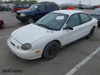 1999 Ford Taurus LX with VIN 1FAFP52U3XA234663, listed as a IAAI auction lot 41997339 with 243,150 mi miles. Bid and sale history available at carsss.com. Image 2.
