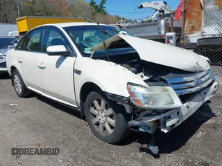 2009 Ford Taurus SE with VIN 1FAHP23W89G113022, listed as a IAAI auction lot 42118187 with 135,319 mi miles. Bid and sale history available at carsss.com. Image 1.