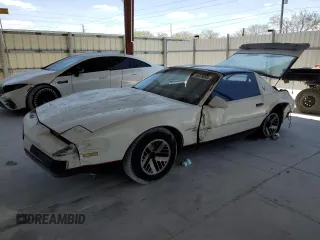 1990 Pontiac Firebird z VIN 1G2FS23E3LL214883, wystawiony jako Copart lot #53039895 z przebiegiem 171 426 mil mil oraz Szkoda całkowita • Salvage title. Historia ofert i sprzedaży dostępna na DreamBid. Obrazek 1.
