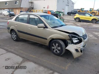 2009 Kia Rio SX with VIN KNADE223196512461, listed as a IAAI auction lot 41520063 with 132,558 mi miles. Bid and sale history available at carsss.com. Image 1.