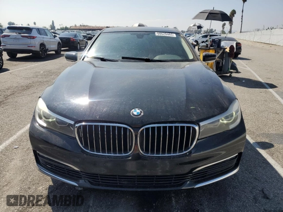 2016 BMW 7 Series 740i with VIN WBA7E2C59GG547804, listed as a Copart auction lot 68620463 with 122,937 mi miles. Bid and sale history available at carsss.com. Image 5.