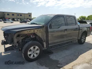 2018 Ford F-150 XL with VIN 1FTEW1CBXJKF52554, listed as a Copart auction lot 52690315 with 141,966 mi miles and Salvage Title. Bid and sale history available at carsss.com. Image 1.