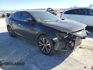 2018 Nissan Maxima Platinum with VIN 1N4AA6APXJC390241, listed as a Copart auction lot 40622004 with 76,879 mi miles and Salvage Title. Bid and sale history available at DreamBid. Image 4.