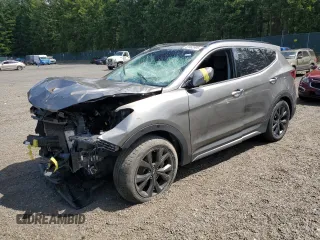 2018 Hyundai Santa Fe Ultimate z VIN 5NMZWDLA2JH107327, wystawiony jako Copart lot #59963995 z przebiegiem 33 899 mil mil oraz Czysty tytuł • Clean title. Historia ofert i sprzedaży dostępna na DreamBid. Obrazek 1.