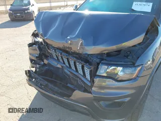 2017 Jeep Grand Cherokee Laredo with VIN 1C4RJFAG7HC769642, listed as a IAAI auction lot 41367874 with 128,095 mi miles. Bid and sale history available at carsss.com. Image 6.