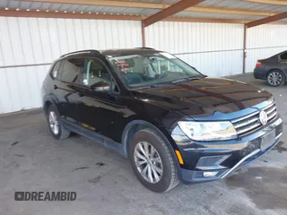 2018 Volkswagen Tiguan S z VIN 3VV1B7AX3JM024361, wystawiony jako IAAI lot #42509937 z przebiegiem 140 439 mil mil oraz . Historia ofert i sprzedaży dostępna na DreamBid. Obrazek 1.