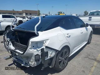 2021 Nissan Sentra SR z VIN 3N1AB8DV0MY245835, wystawiony jako IAAI lot #42320378 z przebiegiem 100 949 mil mil oraz . Historia ofert i sprzedaży dostępna na DreamBid. Obrazek 4.