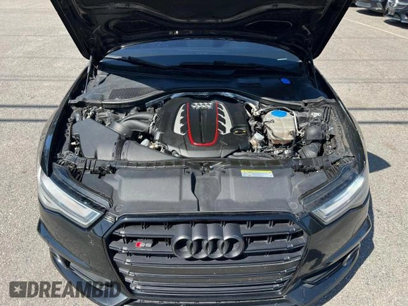 2018 Audi S6 Premium Plus z VIN WAUFFAFC6JN000859, wystawiony jako Copart lot #58193725 z przebiegiem 120 327 mil mil oraz Tytuł czysty. Historia ofert i sprzedaży dostępna na DreamBid. Obrazek 8.