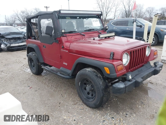 1999 Jeep Wrangler SE with VIN 1J4FY29P6XP408738, listed as a IAAI auction lot 41716999 with 124,692 mi miles. Bid and sale history available at carsss.com. Image 1.