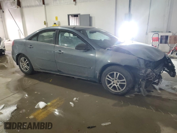 2006 Pontiac G6 with VIN 1G2ZF55BX64180297, listed as a Copart auction lot 41562225 with 206,046 mi miles and Salvage title. Bid and sale history available at DreamBid. Image 4.
