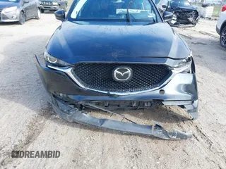 2019 Mazda CX-5 Touring with VIN JM3KFACM0K0692007, listed as a IAAI auction lot 41645657 with 1 mi miles. Bid and sale history available at carsss.com. Image 6.