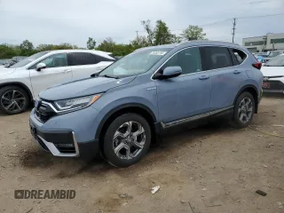2021 Honda CR-V Touring with VIN 7FART6H90ME034214, listed as a Copart auction lot 56860755 with 49,289 mi miles and Salvage title. Bid and sale history available at DreamBid. Image 1.