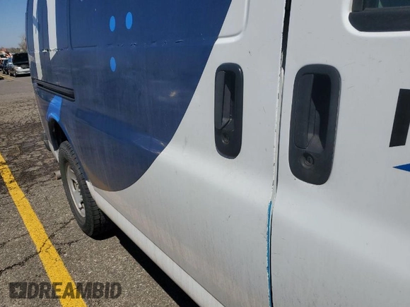 2014 Chevrolet Express Cargo Van with VIN 1GCWGFCA5E1119984, listed as a IAAI auction lot 42100738 with 135,058 mi miles. Bid and sale history available at carsss.com. Image 1.