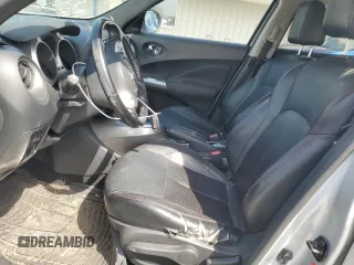 2013 Nissan Juke S with VIN JN8AF5MV7DT214627, listed as a Copart auction lot 50793025 with 130,500 mi miles and Salvage Title. Bid and sale history available at DreamBid. Image 7.
