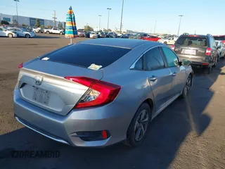 2019 Honda Civic Sedan LX with VIN 2HGFC2F66KH550182, listed as a IAAI auction lot 41861965 with 160,344 mi miles. Bid and sale history available at carsss.com. Image 4.