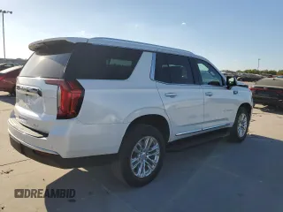 2022 GMC Yukon SLT with VIN 1GKS1BKD1NR259041, listed as a Copart auction lot 77877304 with 27,772 mi miles and Salvage Title. Bid and sale history available at carsss.com. Image 3.
