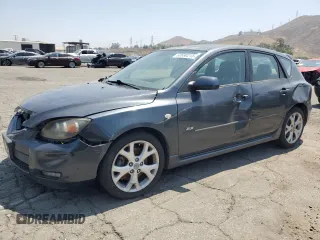 2009 Mazda 3 S Touring with VIN JM1BK344591250908, listed as a Copart auction lot 60690215 with 164,063 mi miles and Salvage title. Bid and sale history available at DreamBid. Image 1.