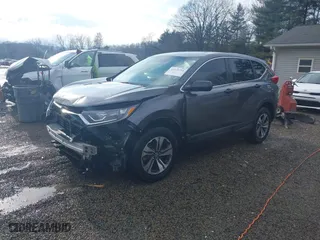 2019 Honda CR-V LX with VIN 5J6RW6H34KL005317, listed as a IAAI auction lot 41225711 with 59,166 mi miles. Bid and sale history available at carsss.com. Image 2.