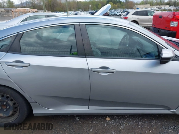 2019 Honda Civic LX with VIN 19XFC2F61KE009471, listed as a IAAI auction lot 42017532 with 81,134 mi miles and . Bid and sale history available at DreamBid. Image 13.
