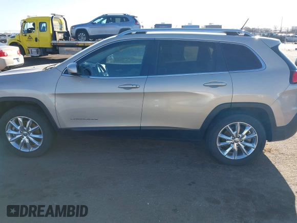 2015 Jeep Cherokee Limited with VIN 1C4PJMDB7FW610031, listed as a IAAI auction lot 41781285 with 51,913 mi miles. Bid and sale history available at carsss.com. Image 14.