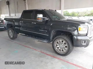 2017 GMC Sierra 2500HD Denali with VIN 1GT12UEY4HF187918, listed as a IAAI auction lot 42384580 with 117,034 mi miles and . Bid and sale history available at DreamBid. Image 1.