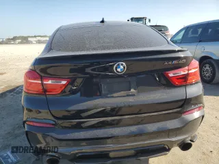 2017 BMW X4 M40i with VIN 5UXXW7C57H0U25271, listed as a Copart auction lot 52867584 with 92,502 mi miles. Bid and sale history available at carsss.com. Image 6.