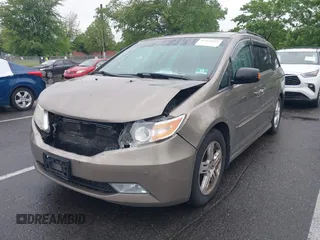 2012 Honda Odyssey Touring с VIN 5FNRL5H98CB060421, выставлен на аукционе IAAI как лот 42378822 с пробегом 249 128 миль миль и . История ставок и продаж доступна на DreamBid. Изображение 2.