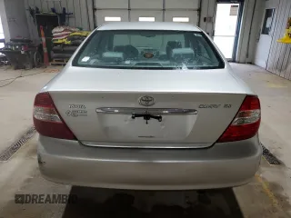 2002 Toyota Camry LE z VIN 4T1BE32K32U063577, wystawiony jako Copart lot #58782185 z przebiegiem 243 589 mil mil oraz Szkoda całkowita • Salvage title. Historia ofert i sprzedaży dostępna na DreamBid. Obrazek 6.