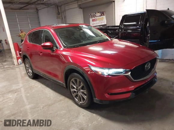 2020 Mazda CX-5 Grand Touring with VIN JM3KFBDM1L1809951, listed as a IAAI auction lot 41345854 with 117,376 mi miles. Bid and sale history available at carsss.com. Image 1.