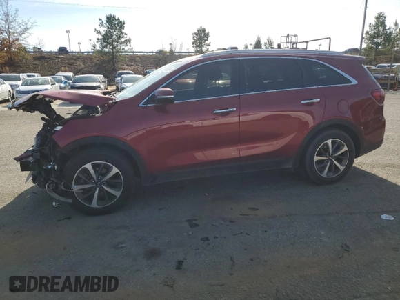 2019 Kia Sorento EX with VIN 5XYPH4A57KG468507, listed as a Copart auction lot 82811094 with 86,587 mi miles and Salvage Title. Bid and sale history available at DreamBid. Image 1.