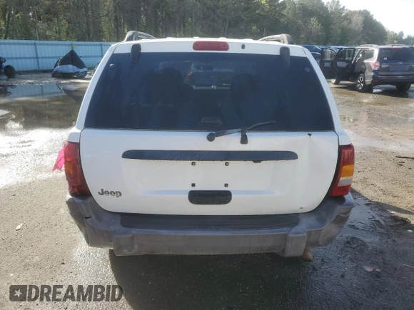 2003 Jeep Grand Cherokee Laredo with VIN 1J4GX48S73C520104, listed as a Copart auction lot 50227245 with 262,348 mi miles and Salvage Title. Bid and sale history available at carsss.com. Image 6.