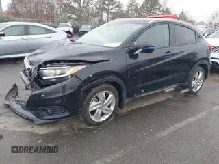 2019 Honda HR-V EX with VIN 3CZRU5H52KM704011, listed as a IAAI auction lot 41616517 with 57,921 mi miles. Bid and sale history available at carsss.com. Image 2.