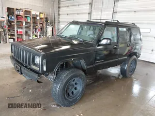1998 Jeep Cherokee Sport with VIN 1J4FJ68SXWL281659, listed as a IAAI auction lot 42208563 with 203,992 mi miles and . Bid and sale history available at DreamBid. Image 2.