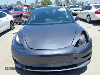 2023 Tesla Model 3 with VIN 5YJ3E1EA1PF545402, listed as a IAAI auction lot 42671354 with 37,948 mi miles and . Bid and sale history available at DreamBid. Image 13.
