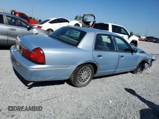 1999 Mercury Grand Marquis GS z VIN 2MEFM74W5XX711421, wystawiony jako Copart lot #53062605 z przebiegiem 106 913 mil mil oraz Nie do naprawy • Non repairable. Historia ofert i sprzedaży dostępna na DreamBid. Obrazek 3.