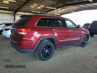 2013 Jeep Grand Cherokee Overland with VIN 1C4RJECT6DC526743, listed as a Copart auction lot 50203065 with 186,673 mi miles and Salvage Title. Bid and sale history available at DreamBid. Image 3.