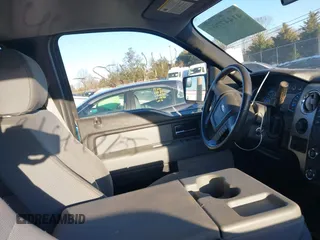 2014 Ford F-150 XL with VIN 1FTFW1EF9EKF51826, listed as a IAAI auction lot 41447705 with 144,051 mi miles. Bid and sale history available at carsss.com. Image 5.