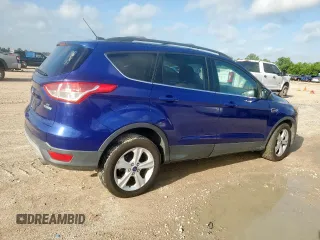 2015 Ford Escape SE z VIN 1FMCU0G96FUB88400, wystawiony jako Copart lot #61174495 z przebiegiem Nie podano mil oraz Czysty tytuł • Clean title. Historia ofert i sprzedaży dostępna na DreamBid. Obrazek 3.