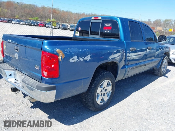 2005 Dodge Dakota SLT with VIN 1D7HW48N05S339156, listed as a IAAI auction lot 41862684 with 158,796 mi miles and . Bid and sale history available at DreamBid. Image 4.