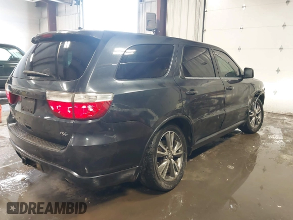2013 Dodge Durango R/T z VIN 1C4SDJCT2DC662269, wystawiony jako IAAI lot #41602661 z przebiegiem 180 014 mil mil oraz . Historia ofert i sprzedaży dostępna na DreamBid. Obrazek 4.