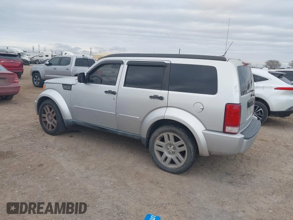 2010 Dodge Nitro SE with VIN 1D4PT2GK8AW144406, listed as a IAAI auction lot 41590691 with 165,959 mi miles and . Bid and sale history available at DreamBid. Image 3.