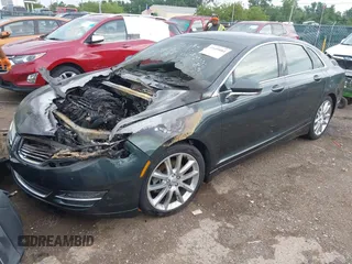 2016 Lincoln MKZ z VIN 3LN6L2GK4GR605486, wystawiony jako IAAI lot #42609084 z przebiegiem Nie podano mil oraz . Historia ofert i sprzedaży dostępna na DreamBid. Obrazek 2.