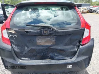 2017 Honda Fit LX z VIN 3HGGK5H58HM706357, wystawiony jako IAAI lot #42371826 z przebiegiem 91 099 mil mil oraz . Historia ofert i sprzedaży dostępna na DreamBid. Obrazek 6.